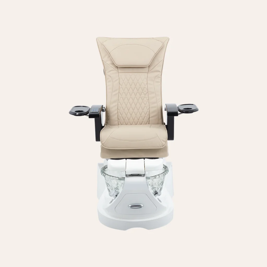 A sleek, modern pedicure chair with a minimalist, plumbless design, featured in the James Barber Shop. The chair's ergonomic shape and cushioned, contoured seat provide unparalleled comfort and support for the client's feet and legs. Soft, indirect lighting casts a warm, relaxing glow, while the matte, neutral-toned finish blends seamlessly with the salon's refined, spa-like ambiance. The chair's innovative, streamlined structure elevates the pedicure experience, allowing for easy mobility and efficient workflow.
