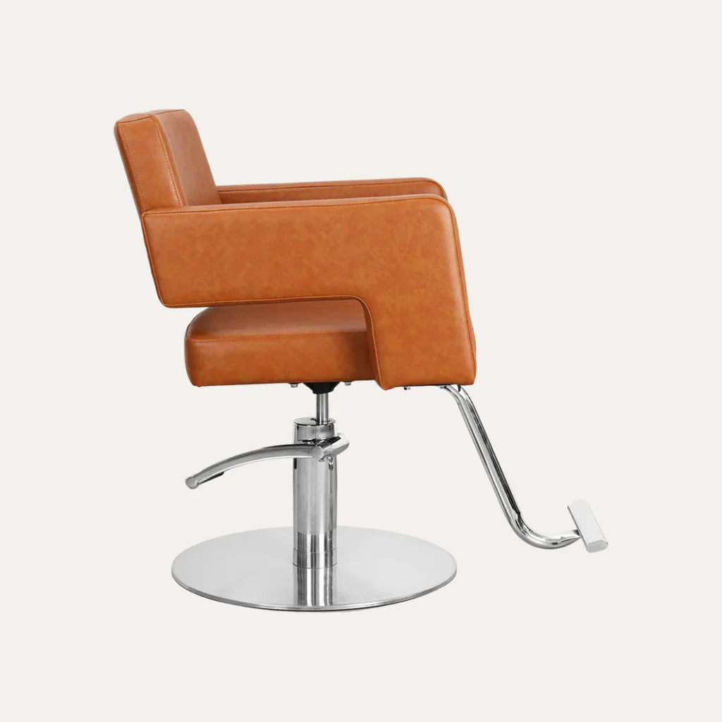 A well-lit, professional beauty salon setting with a focus on a James Barber Shop hydraulic leather salon chair. The chair is positioned in the center, with a serene, minimalist background featuring neutral tones and clean lines. The camera angle is slightly elevated, capturing the intricate details of the chair's maintenance - polishing the chrome accents, conditioning the leather, and adjusting the tension of the swivel mechanism. Soft, diffused lighting creates a calming atmosphere, emphasizing the importance of proper care and upkeep for these stylish and comfortable fixtures.
