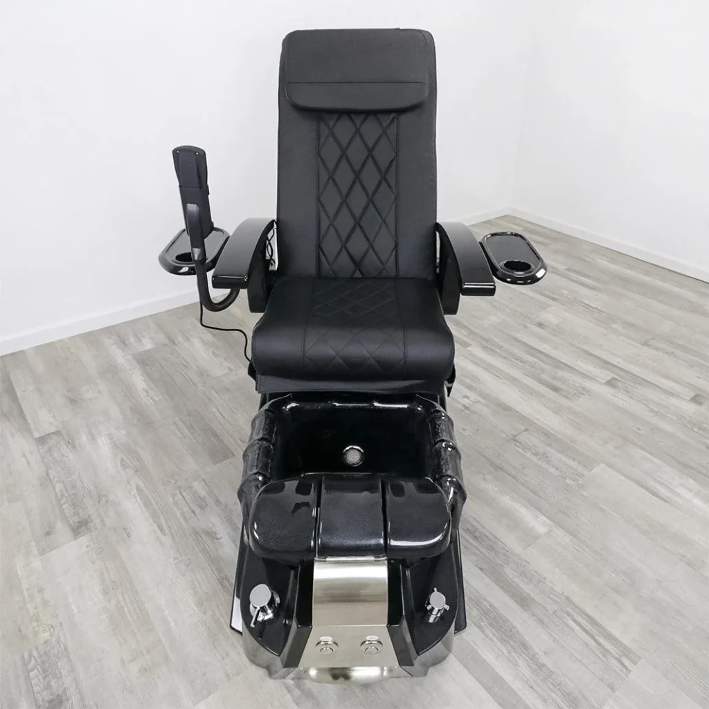 Luxurious pedicure chairs in a high-end salon setting. Plush leather upholstery in a rich, burgundy hue. Elegant, curved armrests and ergonomic footrests. Soft, indirect lighting casts a warm, ambient glow. The chairs are arranged in a semi-circular formation, creating an inviting and relaxing atmosphere. In the background, a wall-mounted display showcases the "James Barber Shop" brand name in a sophisticated, cursive font. Sleek, stainless steel accents add a touch of modern sophistication. The overall scene evokes a sense of indulgence and pampering, perfectly suited for a high-end pedicure experience.