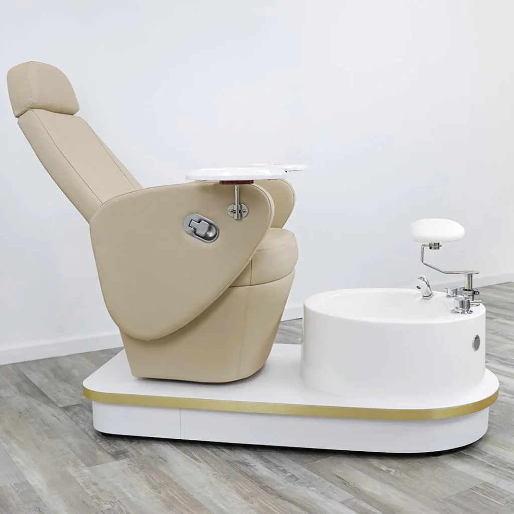 A well-lit, airy spa setting showcases a luxurious pedicure chair from the James Barber Shop. The chair's plush leather upholstery and sleek chrome frame gleam under soft, warm lighting. Nearby, a technician meticulously cleans and conditions the chair, using specialized tools and products to maintain its pristine condition. The background features serene, minimalist decor, allowing the chair to take center stage. The overall scene conveys a sense of tranquility and indulgence, reflecting the high-end pampering experience offered by the James Barber Shop's luxury pedicure chairs.