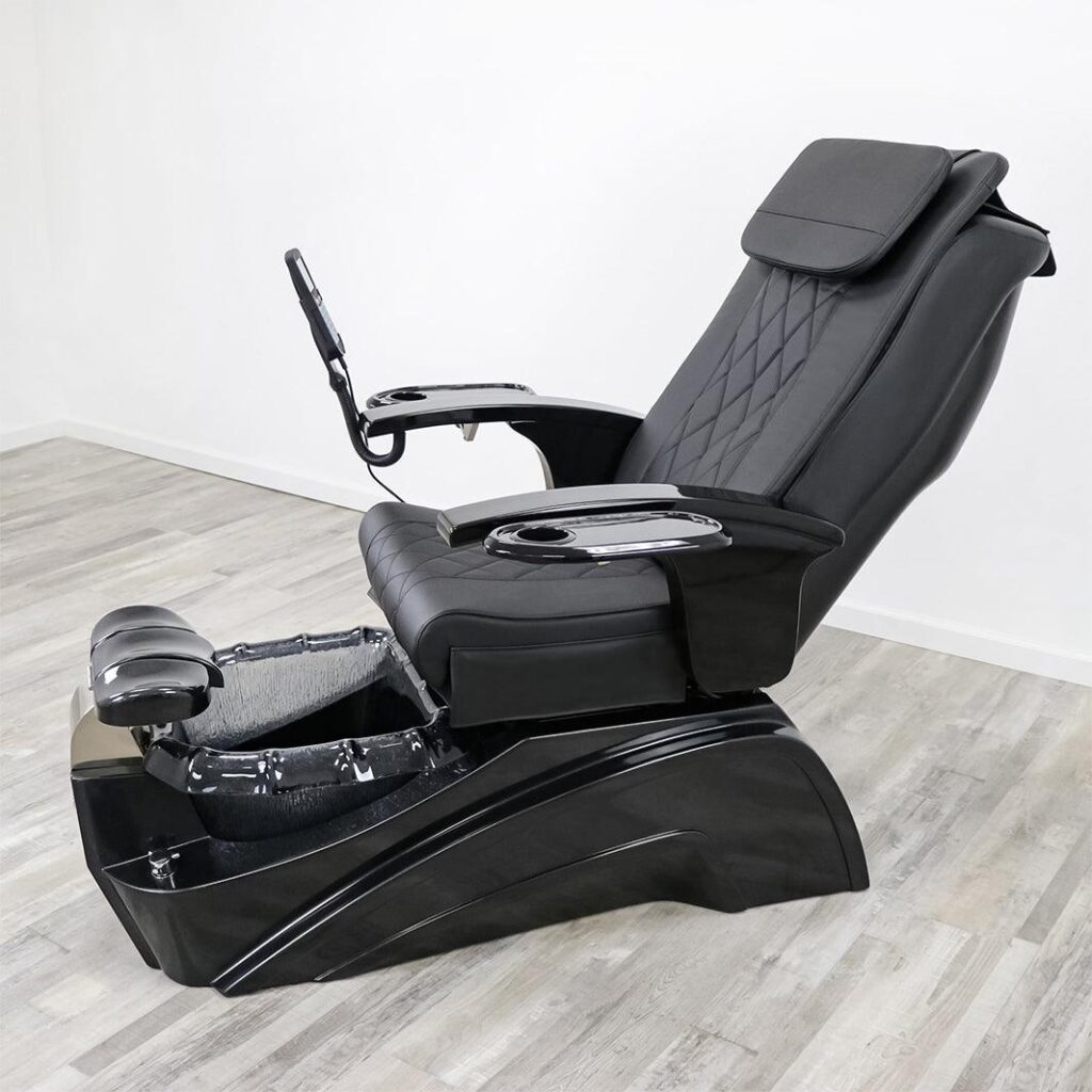 A serene spa setting with luxurious pedicure chairs in a well-lit, modern salon. The chairs are plush and inviting, upholstered in a soft, calming color palette. Warm, diffused lighting casts a gentle glow, creating a relaxing ambiance. In the background, the James Barber Shop logo is subtly displayed, indicating the high-quality, professional experience. The chairs are arranged in a cohesive, visually appealing layout, inviting clients to unwind and indulge in a pampering pedicure session.