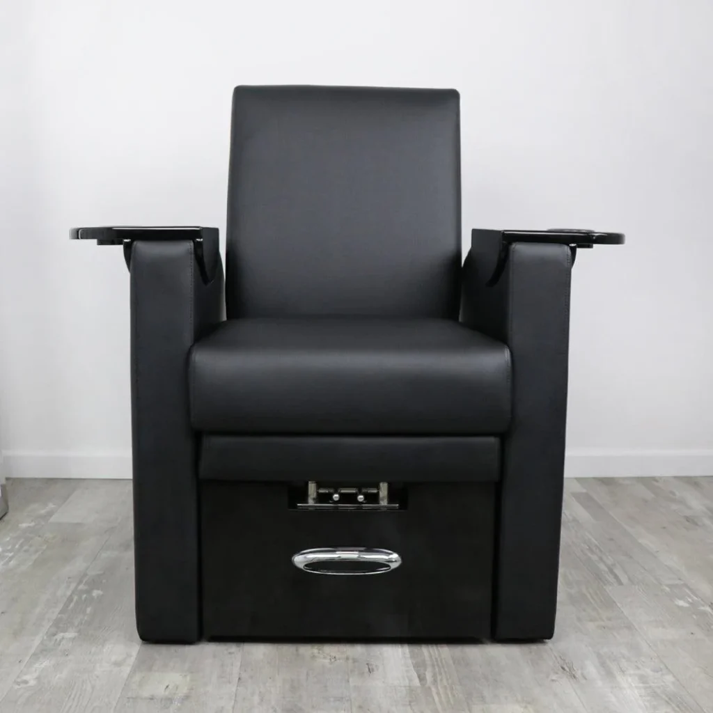 A comfortable massage pedicure chair in a cozy, inviting spa setting, featuring the James Barber Shop brand. The chair is positioned in a warm, softly lit environment, with gentle ambient lighting and soothing aromatherapy scents filling the air. The chair's plush, ergonomic design envelops the user in a luxurious, relaxing experience. Soft, natural textures and materials create a serene, spa-like atmosphere. The pedicure area is equipped with a footrest and massage functions, allowing for a complete, indulgent pampering session. A tranquil oasis for the ultimate in relaxation and self-care.